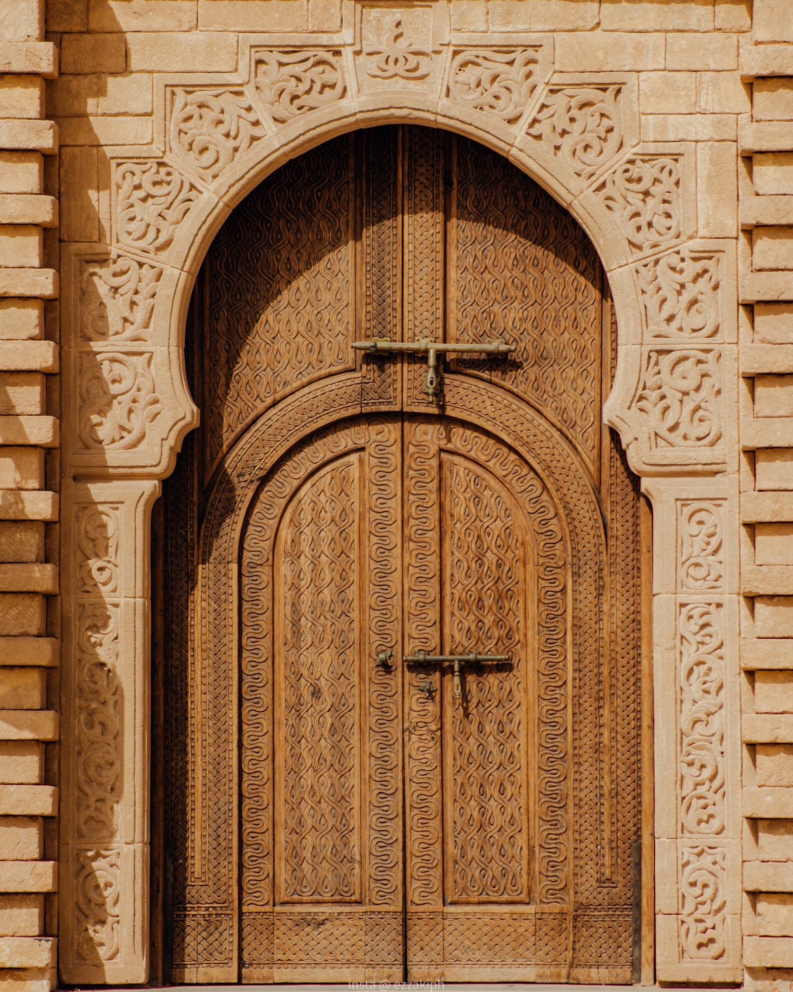 An ornate carved doorway in Lima, Peru.